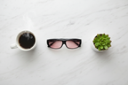 Quamby 001 FL-41 overfit glasses flat lay on marble surface