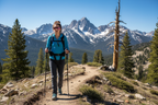 Person wearing FL-41 overfit glasses hiking on a sunny mountain trail